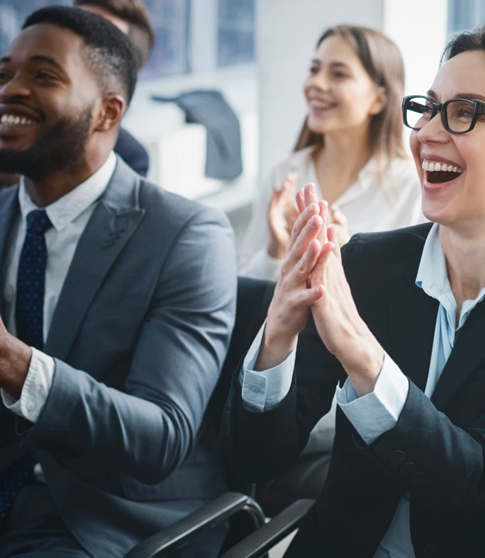 People cheering at event